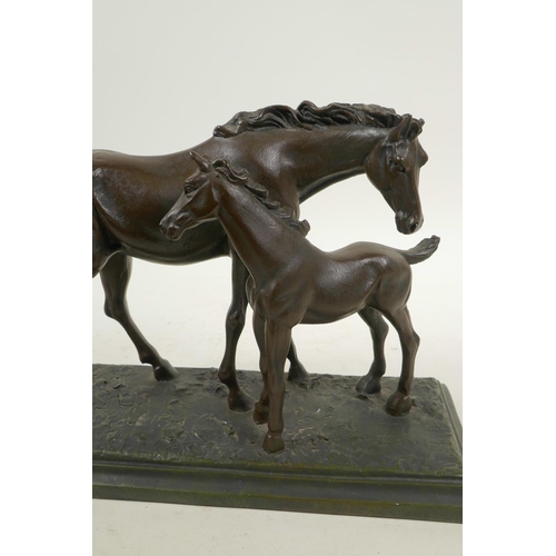 34 - A 'crosa' bronzed composition figure group of a horse and foal, 10½