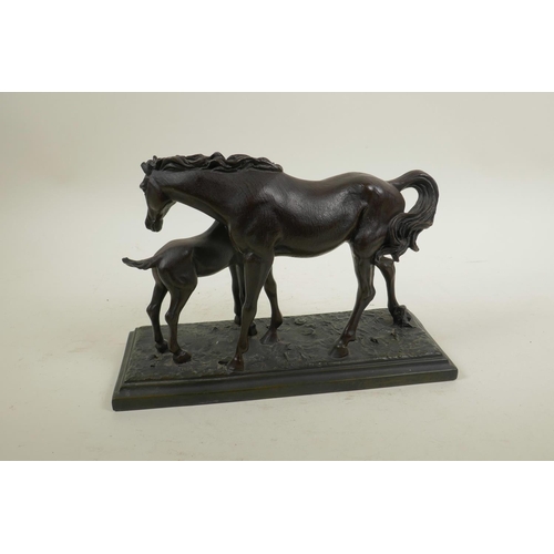 34 - A 'crosa' bronzed composition figure group of a horse and foal, 10½