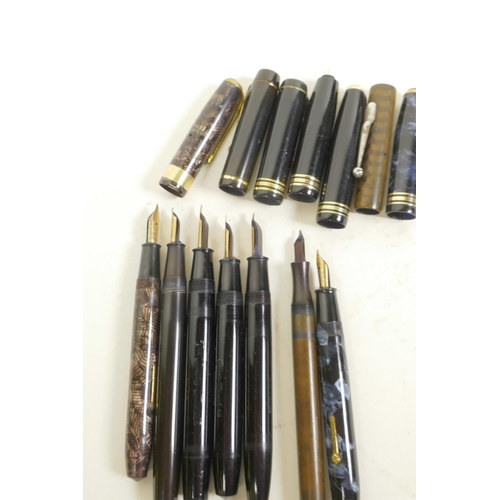 36 - Seven vintage Conway Stewart fountain pens with 14ct gold nibs