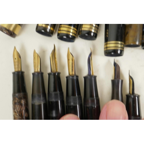 36 - Seven vintage Conway Stewart fountain pens with 14ct gold nibs