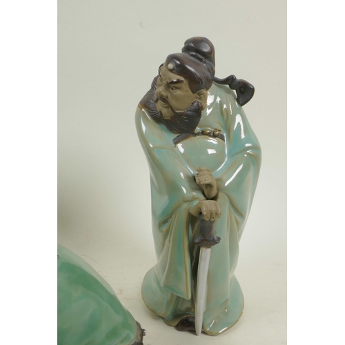 362 - Three Chinese, Shiwan style, mud men figures in green robes, largest 8