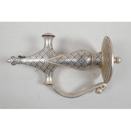 4 - A Mughal style white metal sword handle, 7½