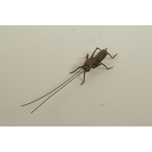 43 - A Japanese Jizai style bronzed metal cricket, with articulated limbs and antennae, 6½