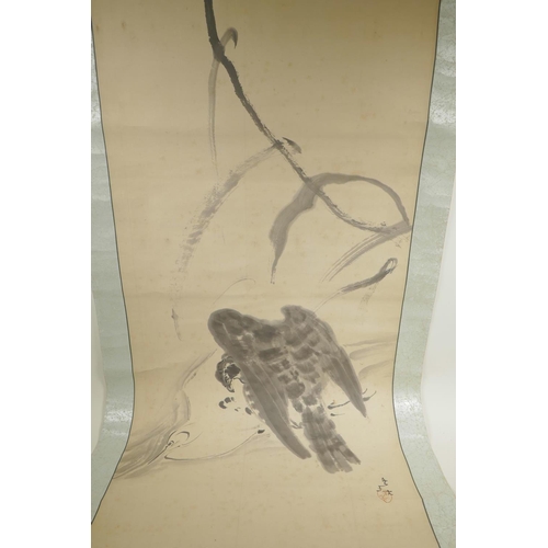 44 - A Chinese monochrome watercolour scroll depicting a hawk attacking prey, 20½