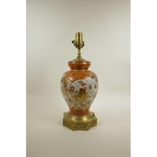 47 - A Japanese Meiji Kutani porcelain vase with brass mounts, converted to a lamp, the body with tanto d... 