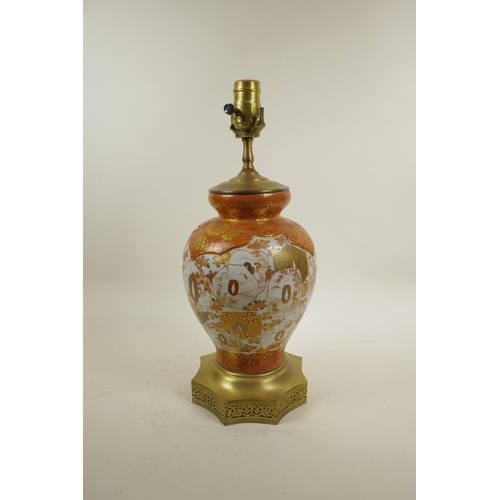 47 - A Japanese Meiji Kutani porcelain vase with brass mounts, converted to a lamp, the body with tanto d... 