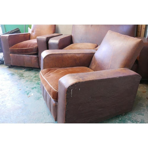 1159 - A 1930s leather and rexine three piece cottage suite, comprising a two seater settee and two tub cha... 