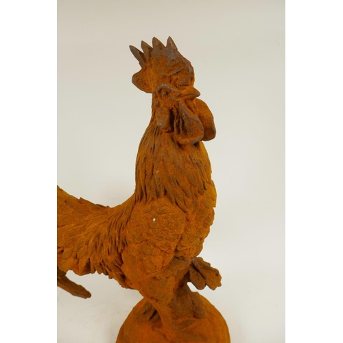 1 - A cast metal garden figure of a cockerel, 17½