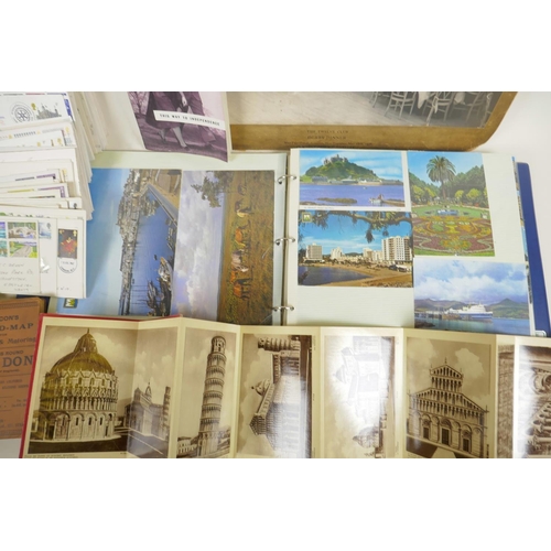 11 - A large quantity of socio-historical ephemera to include postcards, photographs, first day covers et... 