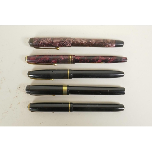 121 - Four Conway Stewart fountain pens and an Esterbrook 'Relief' model 12 fountain pen, all with 14ct go... 