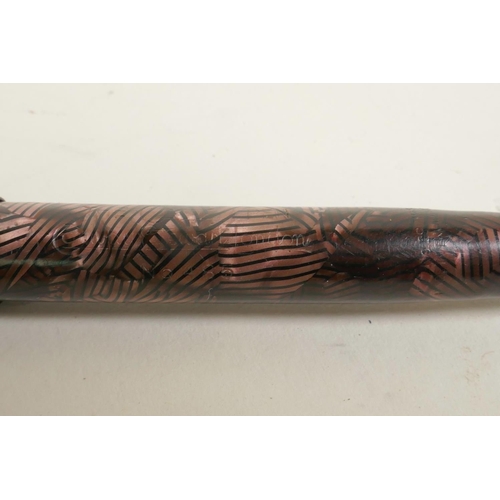 121 - Four Conway Stewart fountain pens and an Esterbrook 'Relief' model 12 fountain pen, all with 14ct go... 