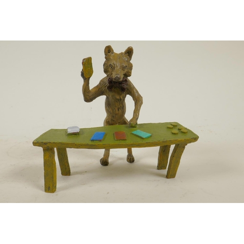 210 - An anthropomorphic cold painted bronze figure of a fox standing at a table dealing black jack cards,... 