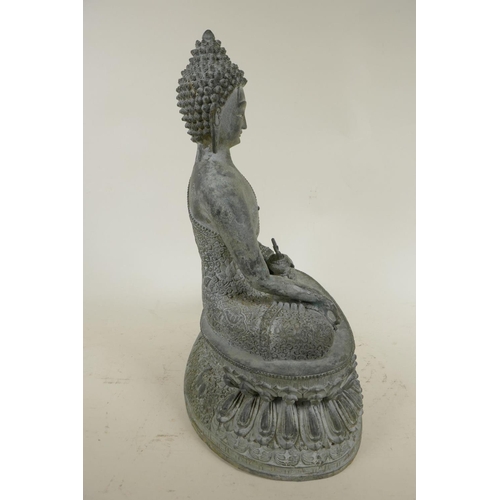 212 - A Chinese bronze figure of Buddha seated in meditation on a lotus throne, 13½