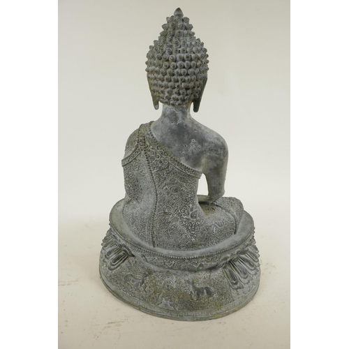 212 - A Chinese bronze figure of Buddha seated in meditation on a lotus throne, 13½