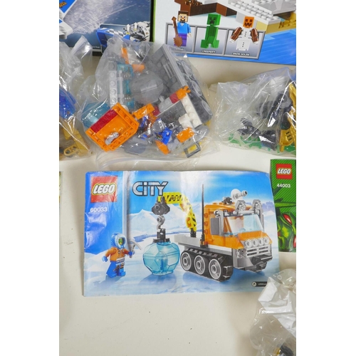 29 - A quantity of Lego sets, some boxed, to include 'Friends, advent calendar 41102', 'Minecraft 21120',... 