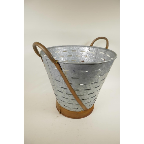 31 - A galvanised iron olive bucket with copper loop handles, 16