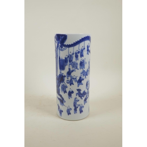 33 - A Chinese blue and white porcelain cylinder vase decorated with 'One Hundred Boys' participating in ... 