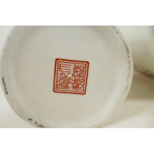 54 - Two Chinese porcelain brush pots decorated with cattle and calligraphy, largest 5