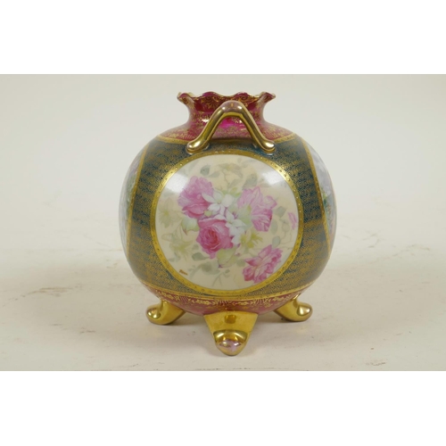 6 - A Vienna porcelain two handled vase in the form of a pomegranate, with transfer printed decorative p... 