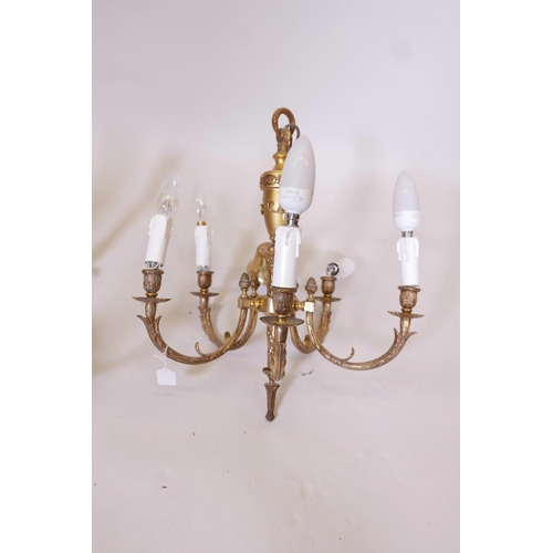 1148 - A brass six branch chandelier, together with another five branch chandelier, largest 26