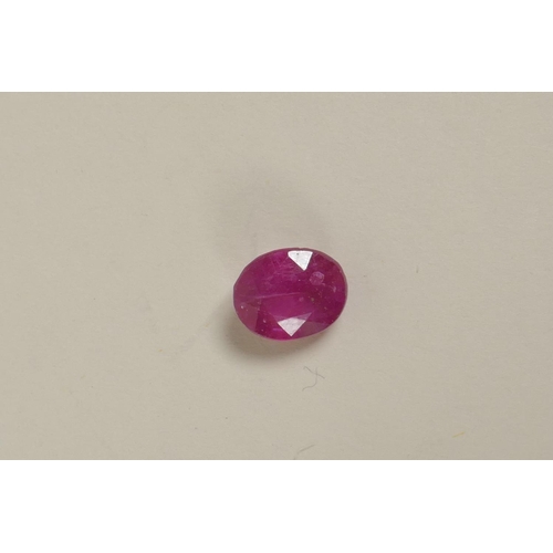 723 - A 4.90ct translucent natural ruby, oval cut, glass filled, colour enhanced, certified, with certific... 