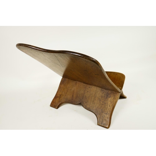 1002 - A Georgian mahogany folding bookstand made from a single piece of timber, 18½