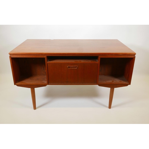 1004 - A Danish 1960s teak two sided desk designed by J. Svenstrup for A.P. Møbler, with six drawers to one... 