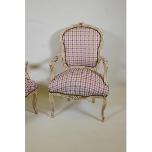 1009 - A pair of Louis style open arm chairs