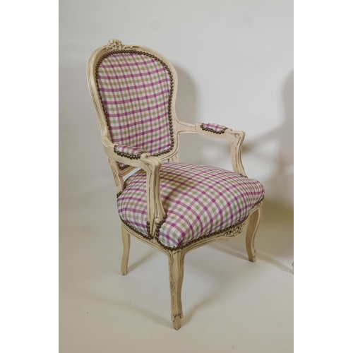 1009 - A pair of Louis style open arm chairs