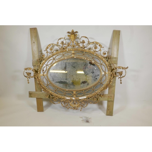 1013 - A C19th Adam style giltwood and composition sectional wall mirror, A/F, 60