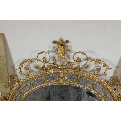 1013 - A C19th Adam style giltwood and composition sectional wall mirror, A/F, 60