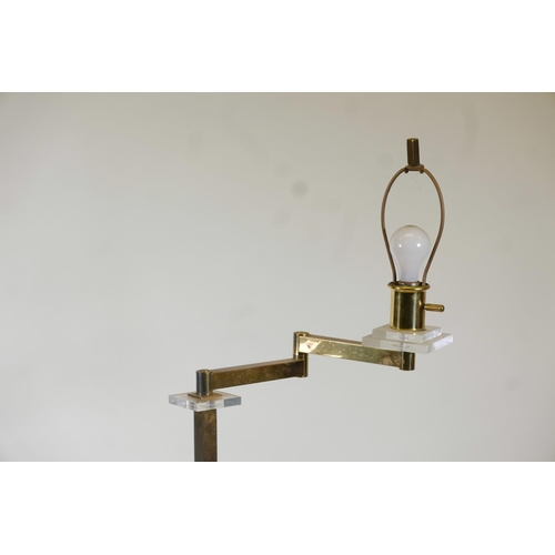 1024 - A brass and lucite standard lamp with cantilever arm