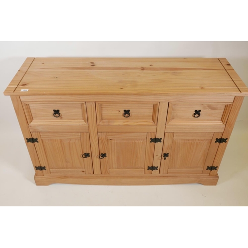 1025 - A pine dresser base with three drawers over three doors, 53