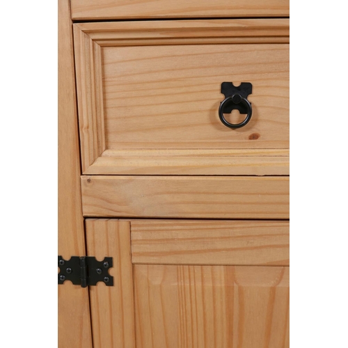 1025 - A pine dresser base with three drawers over three doors, 53