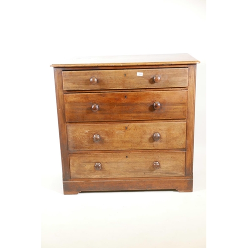 1030 - A Victorian mahogany chest of four long drawers, raised on a plinth base, 38