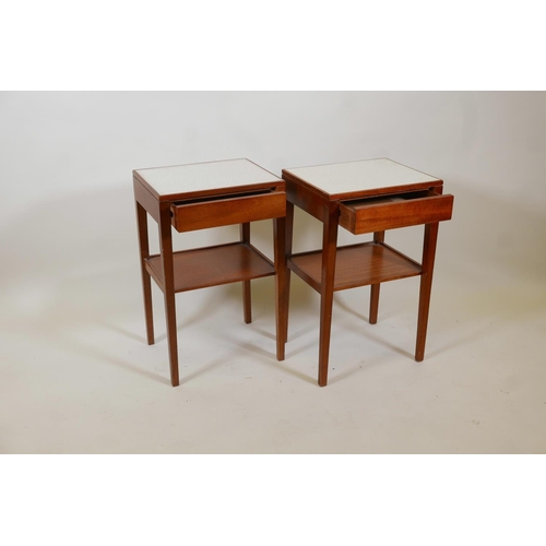 1036 - A pair of mid century Remploy teak bedside tables with a formica top, single drawer and undertier, r... 