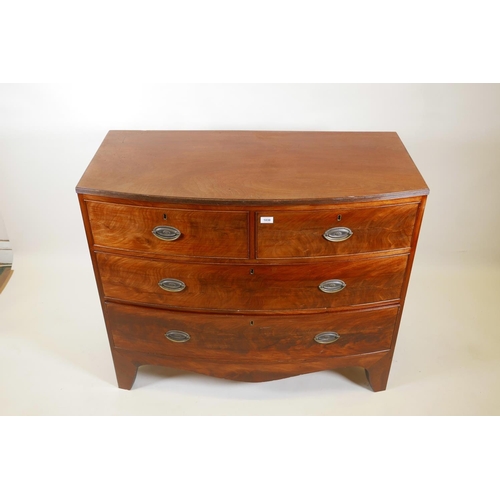 1038 - A Georgian mahogany bow front chest with reeded edge top and two over three drawers, with brass plat... 