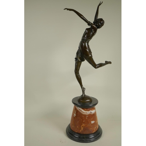 105 - An Art Deco style figure of a dancing girl on a marble plinth, 26