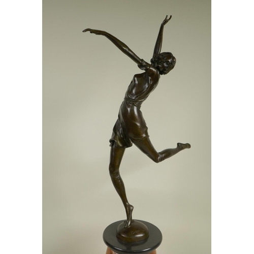 105 - An Art Deco style figure of a dancing girl on a marble plinth, 26