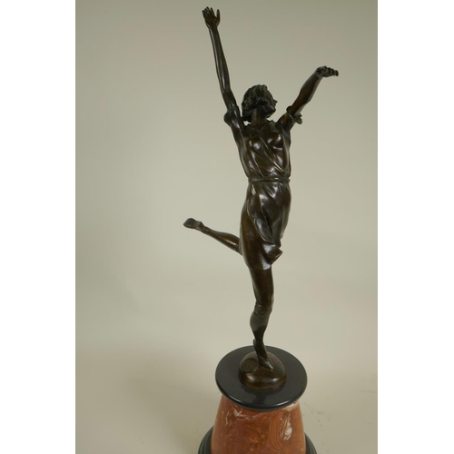 105 - An Art Deco style figure of a dancing girl on a marble plinth, 26