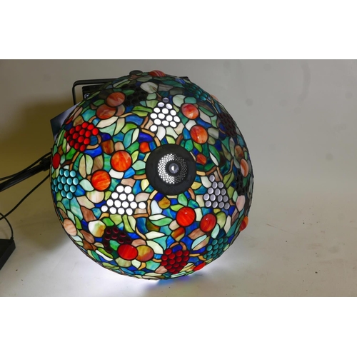 1067 - A vintage Tiffany style hanging lamp shade with grape and fruit designs, 23