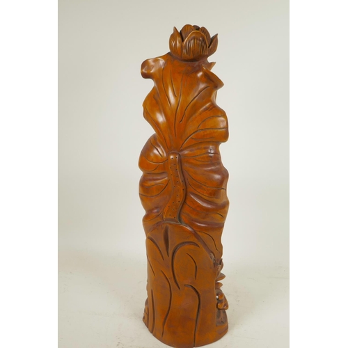 107 - A Chinese carved wood figure of Guan Yin standing on a lotus throne, 20