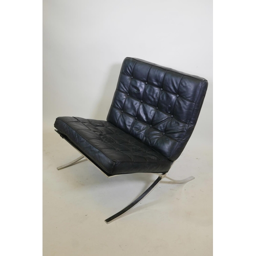 1071 - A chrome and black leather 'Barcelona' chair after Mies van der Rohe, lacks strapping, 29