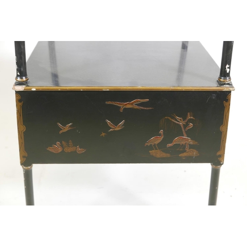 1072 - A chinoiserie back lacquer four tier whatnot on turned supports, with gilt decoration of figures and... 