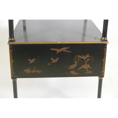 1072 - A chinoiserie back lacquer four tier whatnot on turned supports, with gilt decoration of figures and... 