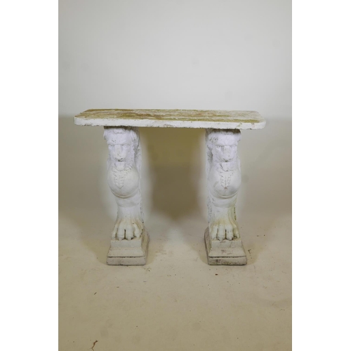 1093 - A vintage painted reconstituted stone/concrete garden console table raised on winged griffin support... 