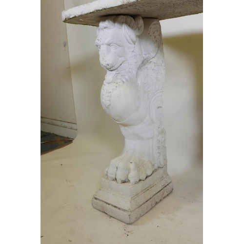 1093 - A vintage painted reconstituted stone/concrete garden console table raised on winged griffin support... 