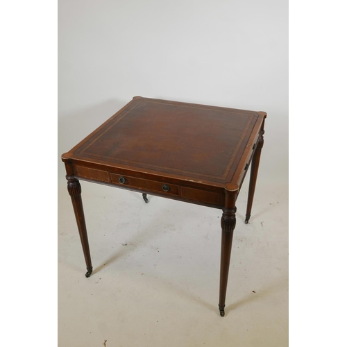 1098 - An American Federal style inlaid mahogany centre table, with leather inset top and cupped corners, t... 