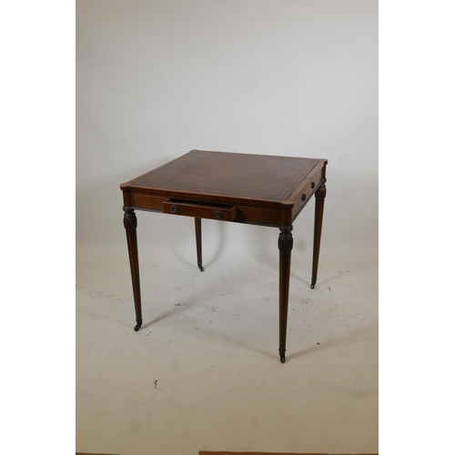 1098 - An American Federal style inlaid mahogany centre table, with leather inset top and cupped corners, t... 