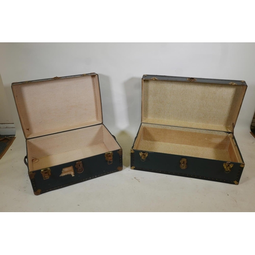 1107 - Two vintage metal strapped travel trunks, largest 36